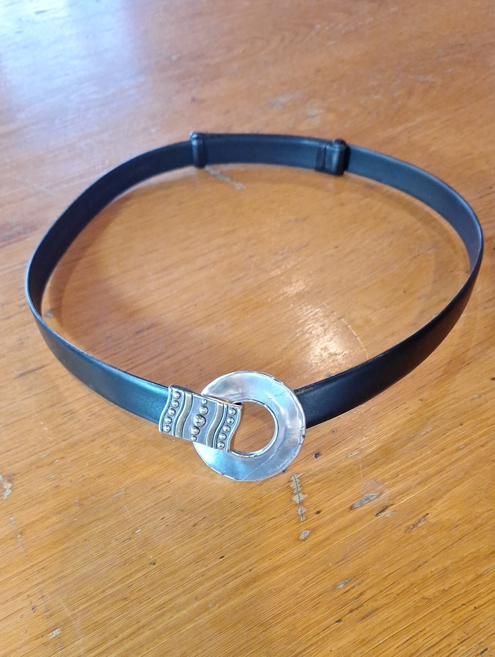 Chico's Black Leather Adjustable Belt with Silver Circular Decorative Buckle